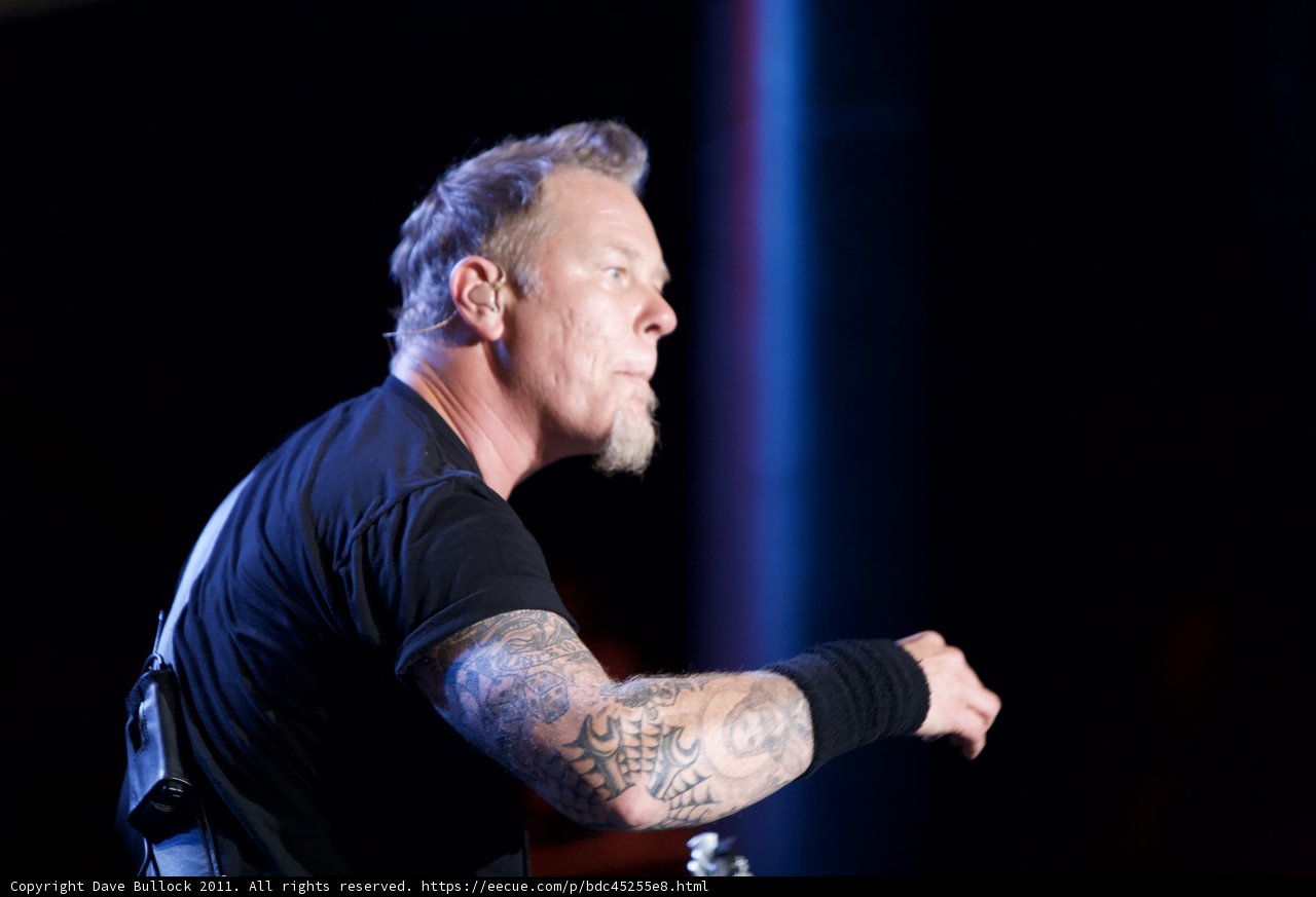 Metallichead Rocking the Stage with His Guitar