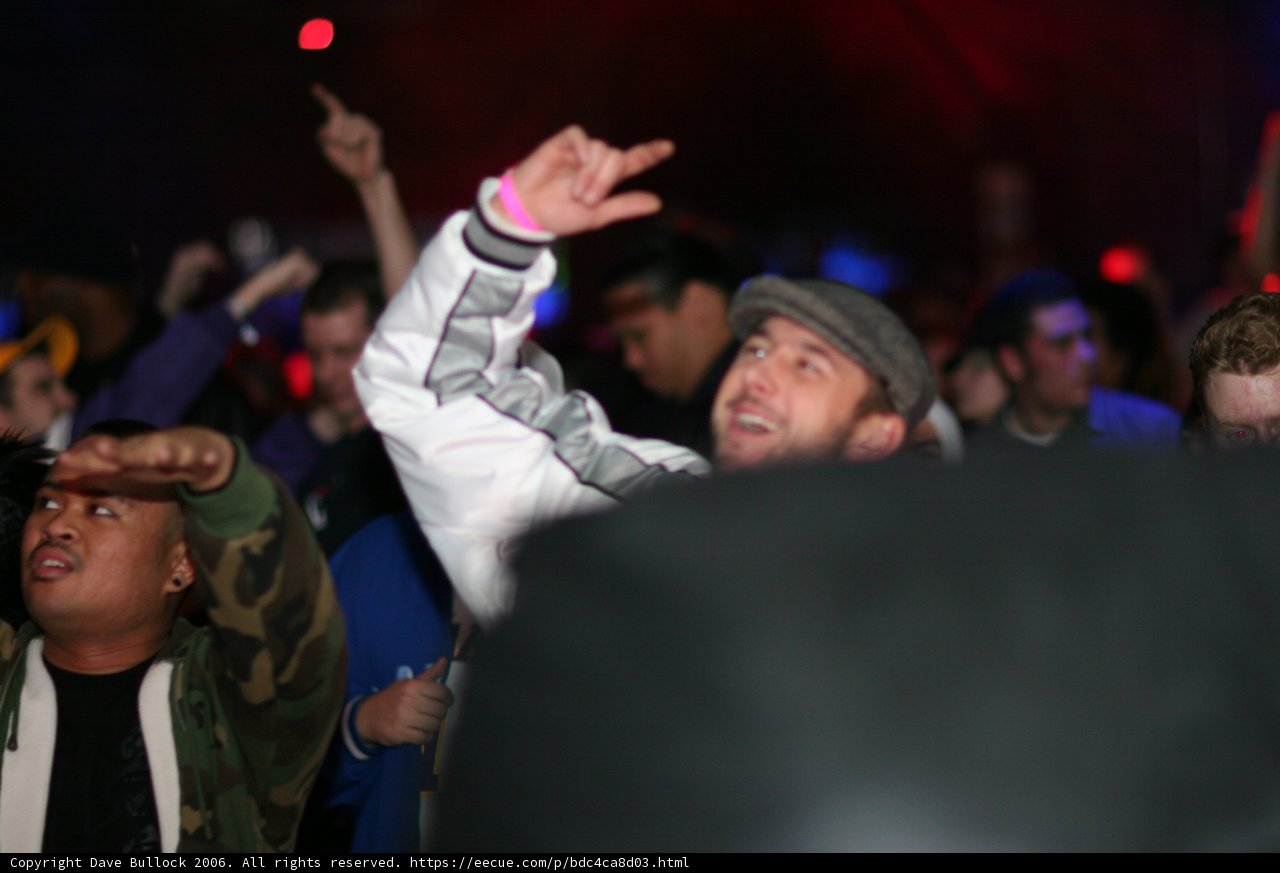 Urban partygoer in stylish jacket and hat