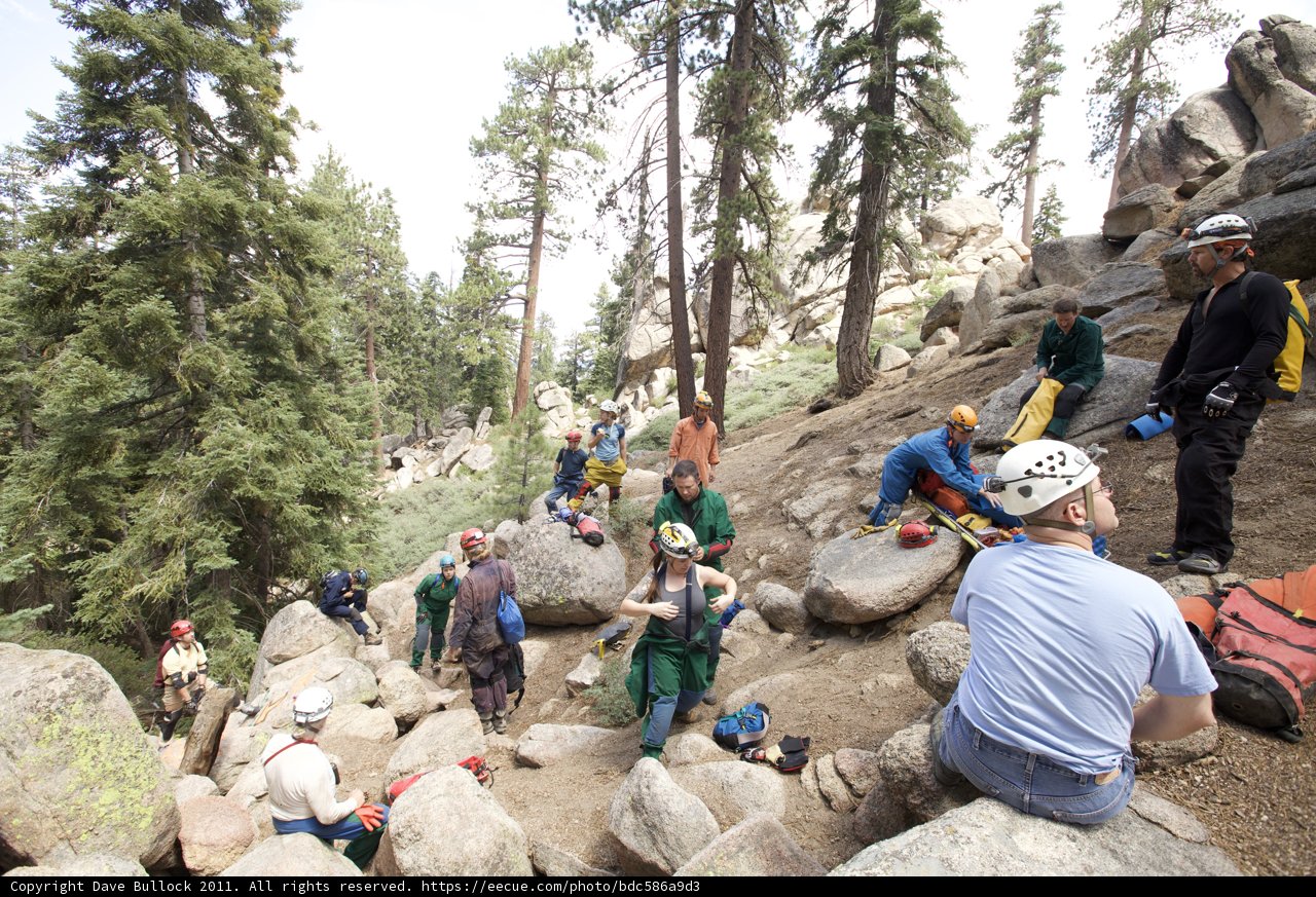 Hikers tackle rocky trail through the wilderness