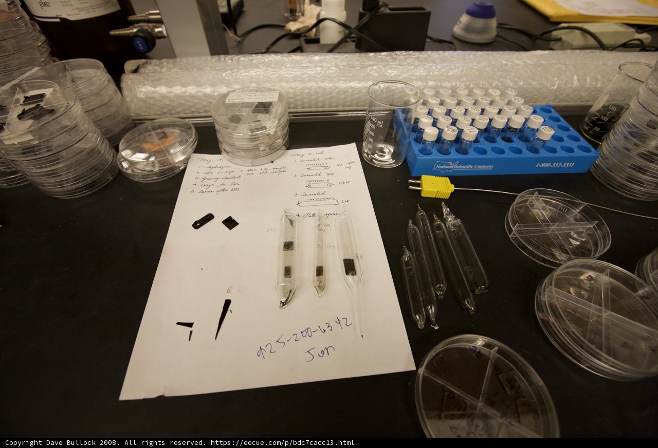 Lab Table with Test Tubes and White Board