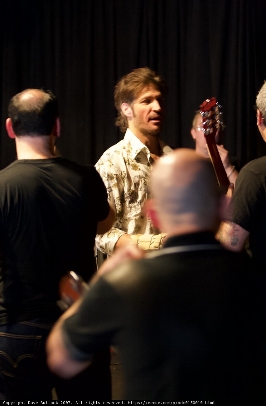 The Guitarist and the Crowd