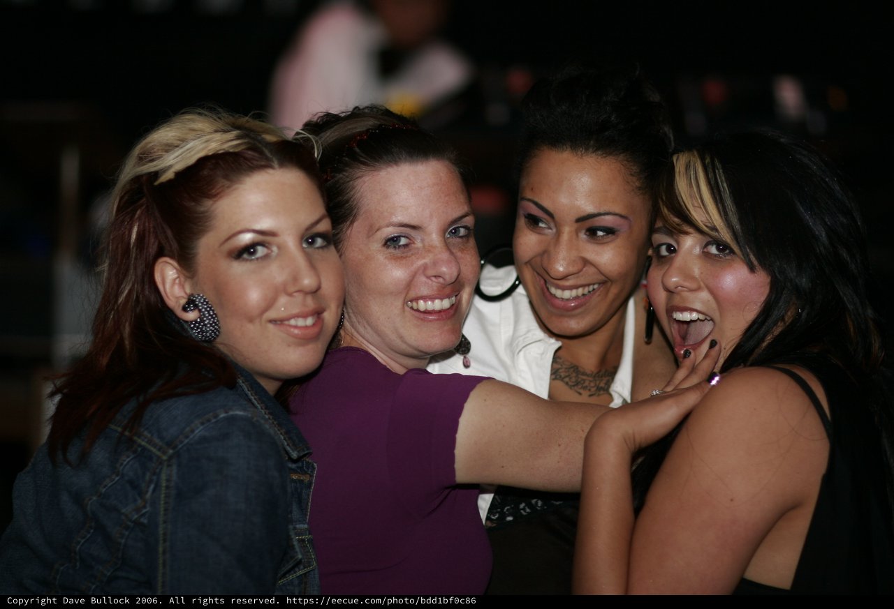 Four Friends Celebrate at a Nightclub Event 2006