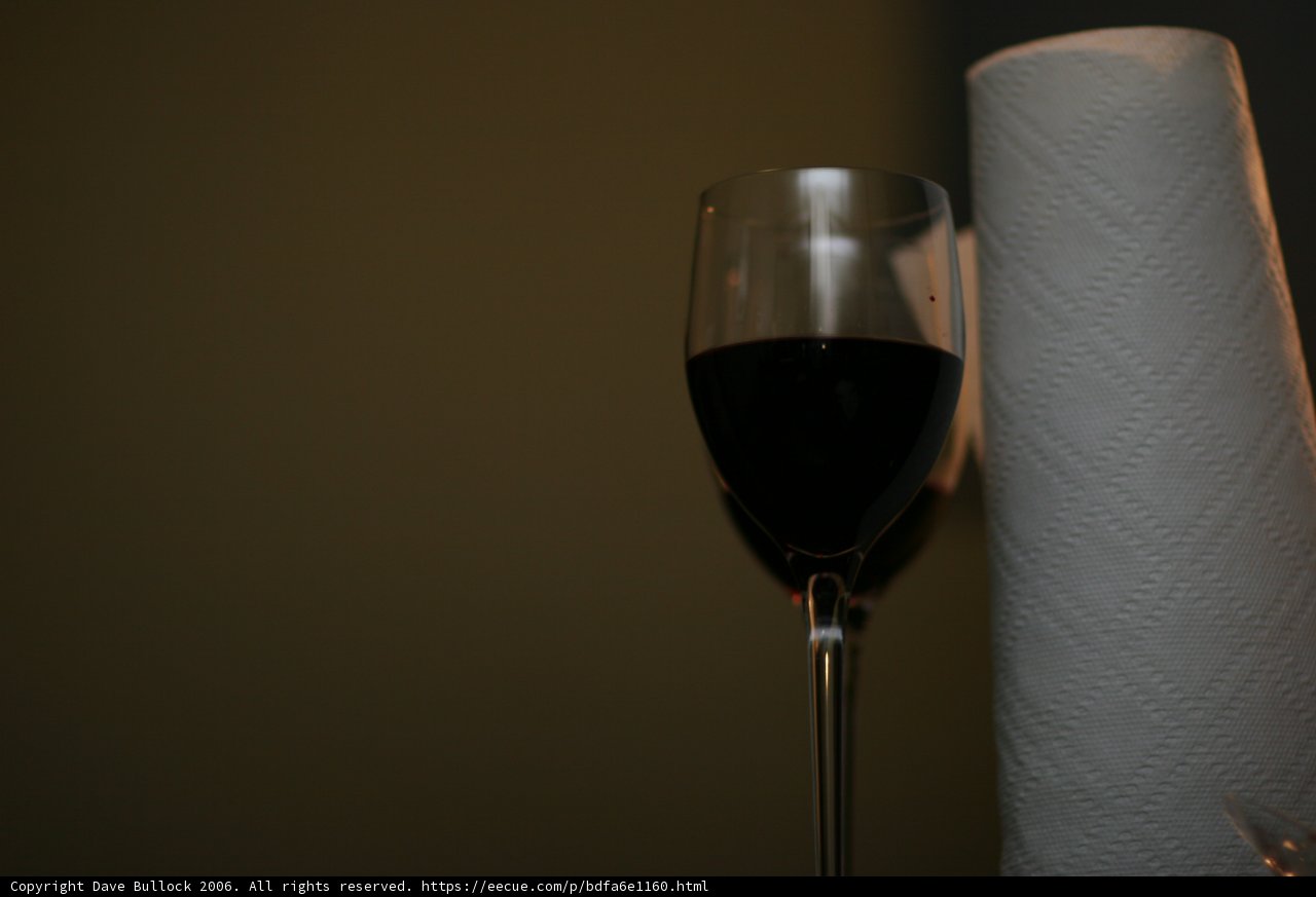 A Glass of Red Wine on a White Napkin
