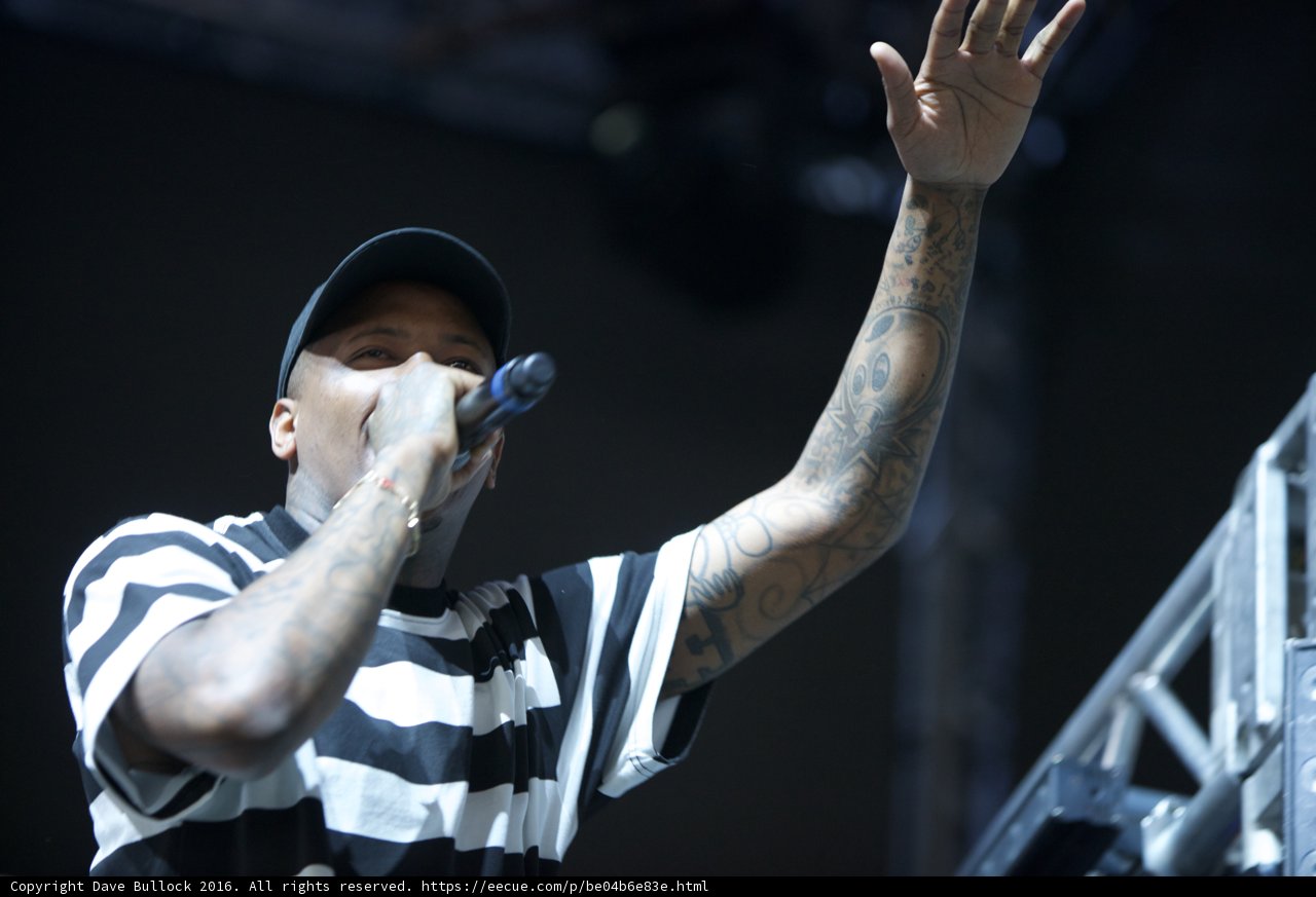 Tattooed Man Strikes a Pose at Coachella