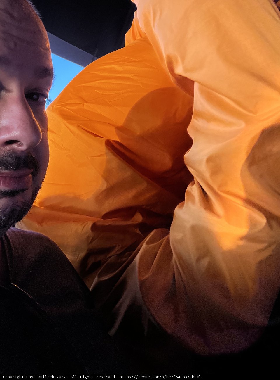 The Man and His Orange Bag