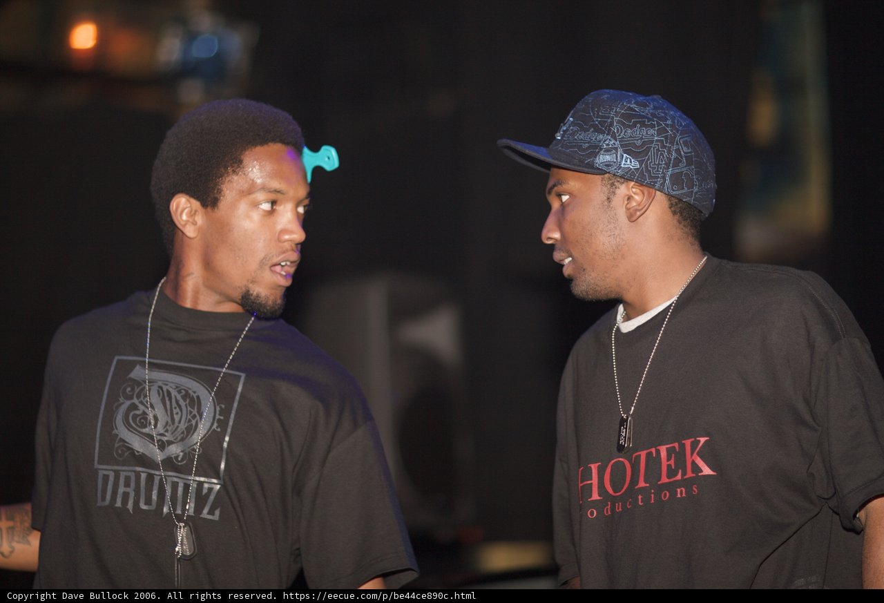 Two Men in Baseball Caps