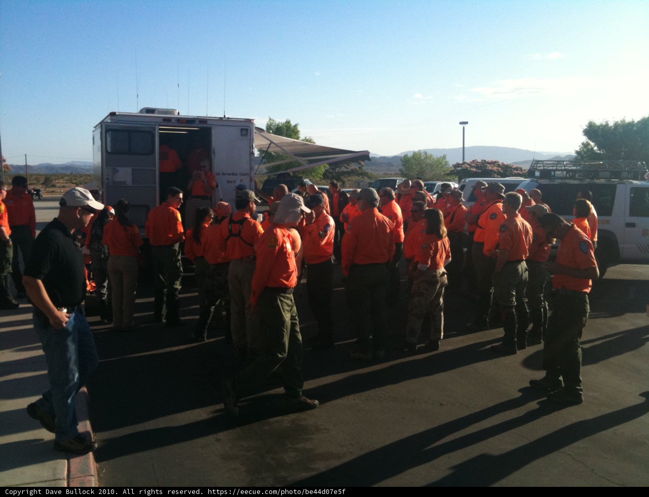 Orange Clad Crowd in the Parking Lot