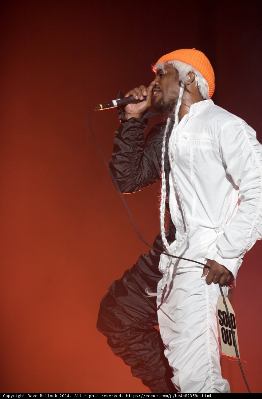 Orange Hat and White Pants on Coachella Stage