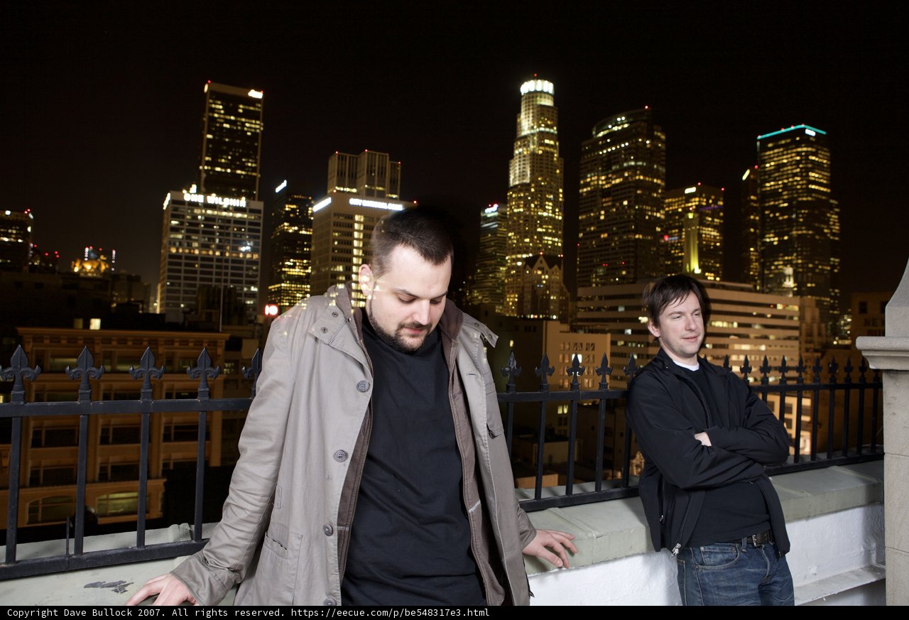 Two Men Enjoying the City Lights