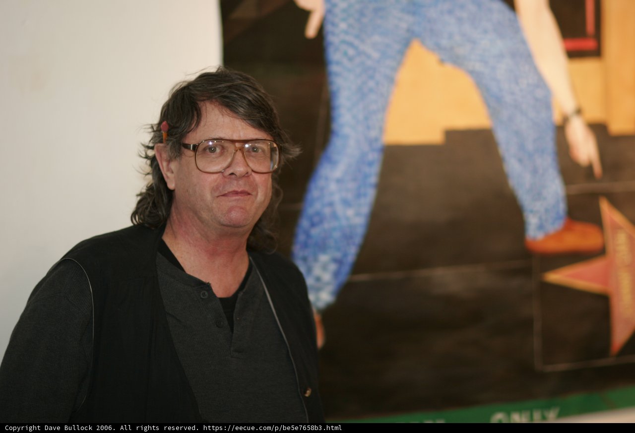 Man with Glasses Admiring Artwork