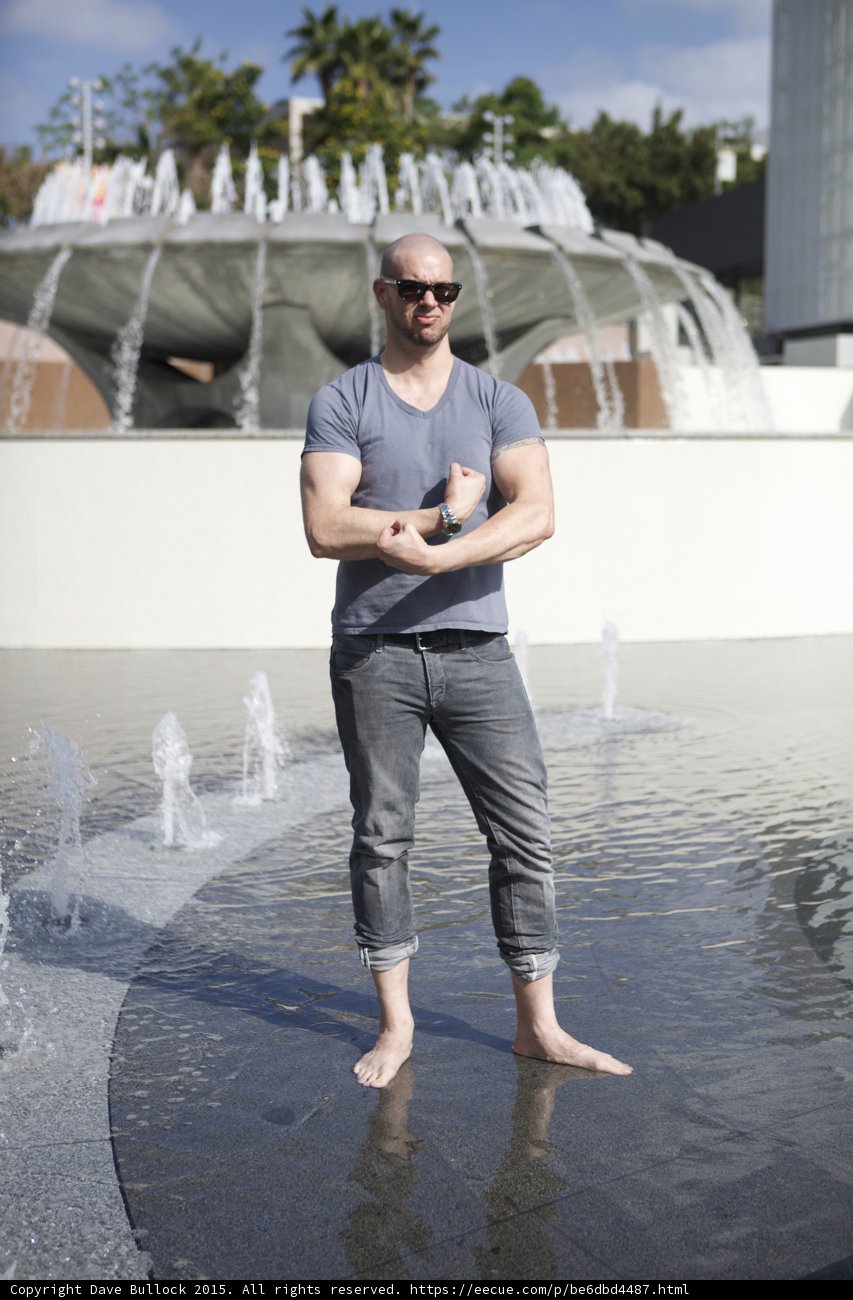 Playful Pose in Fountain