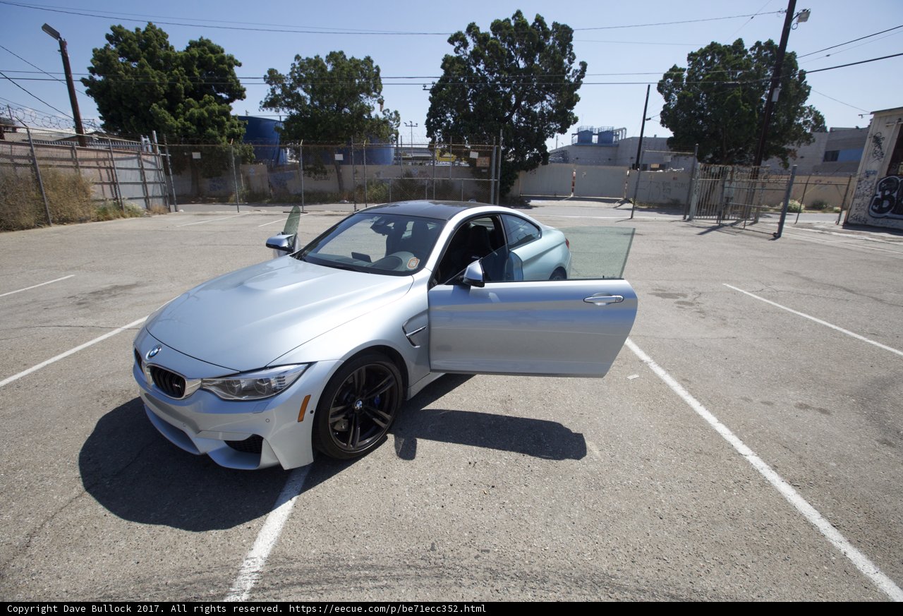 Parked BMW M4 with Spoke Alloy Wheels