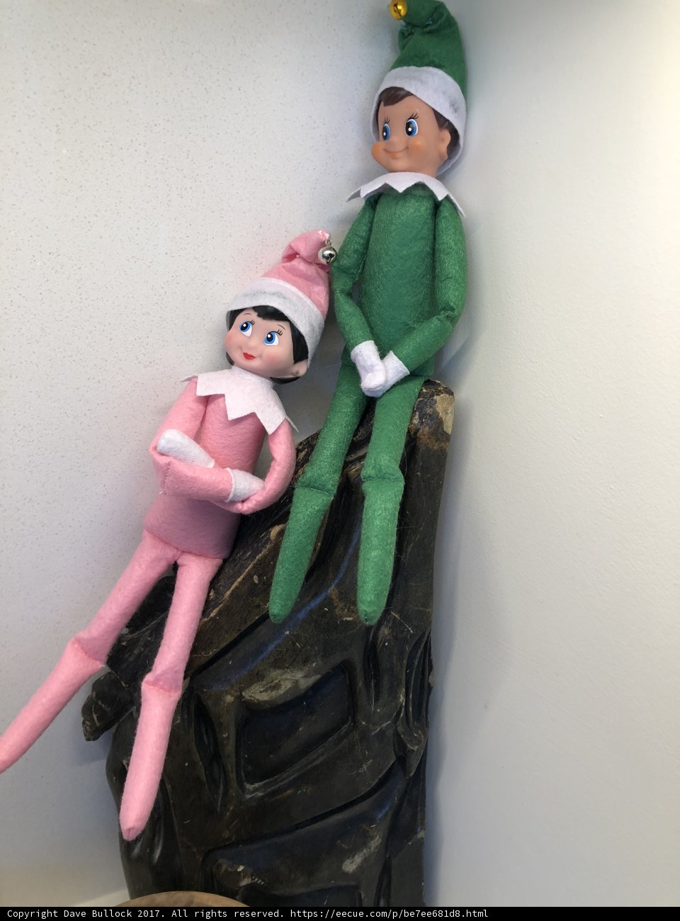 Elf Dolls Perched on a Shelf