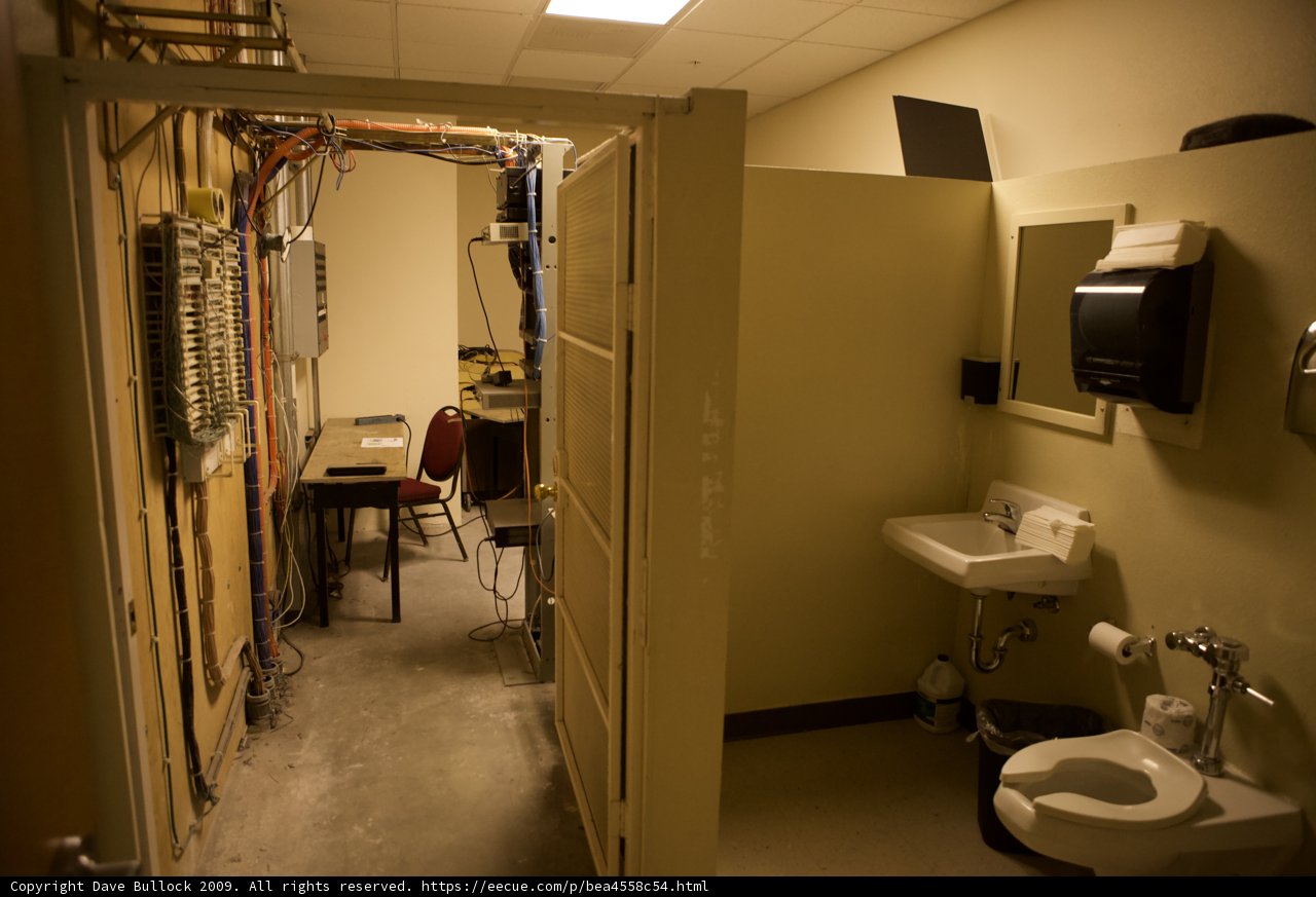 Hospital Bathroom Interior with Sink, Toilet and Mirror