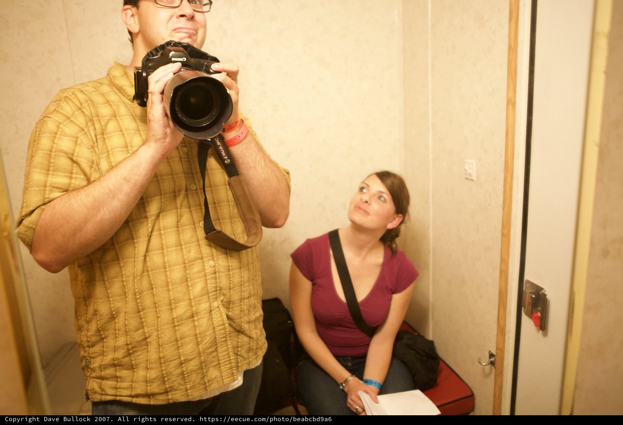 Photographer and Friend in Cramped Indoor Space