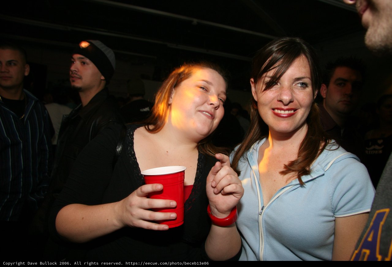 Two Friends Celebrating New Year's Eve 2005 Party