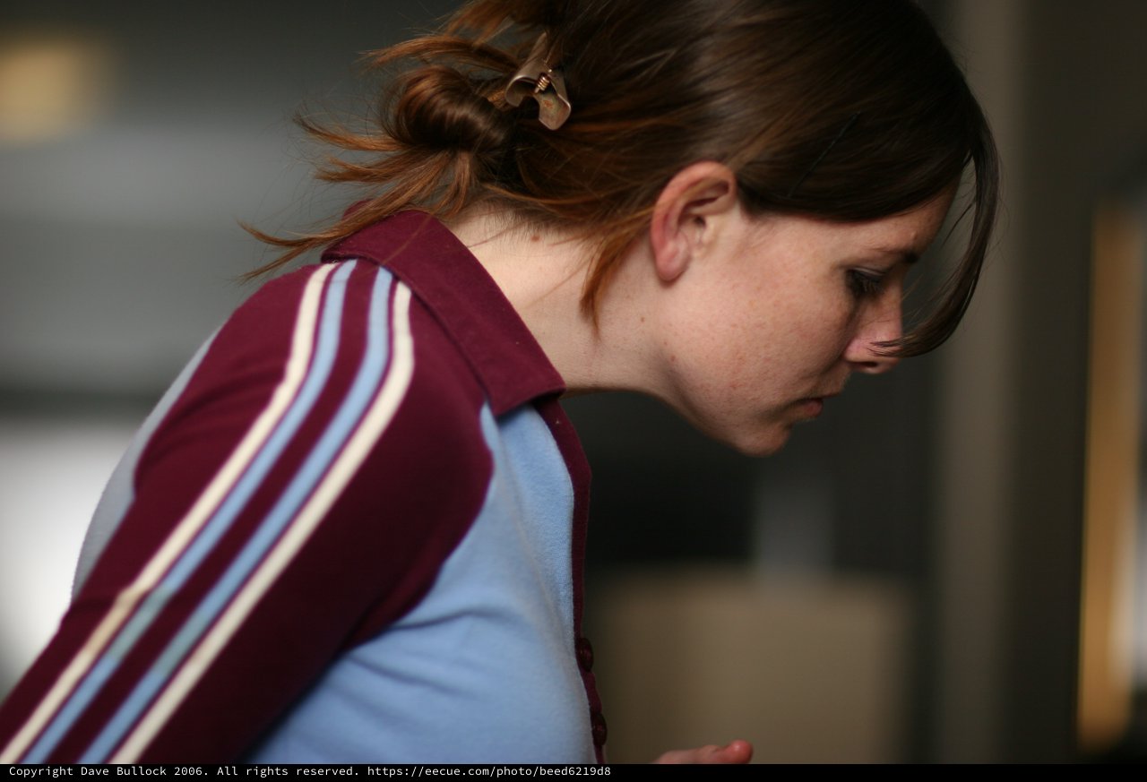 Young Woman Lost in Thought, Profile Portrait