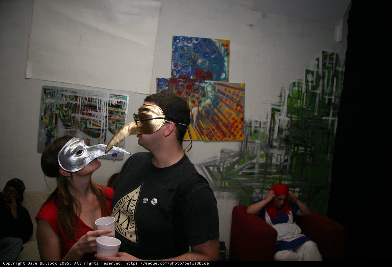 Masquerade Party Revelers in Bird Beak Masks
