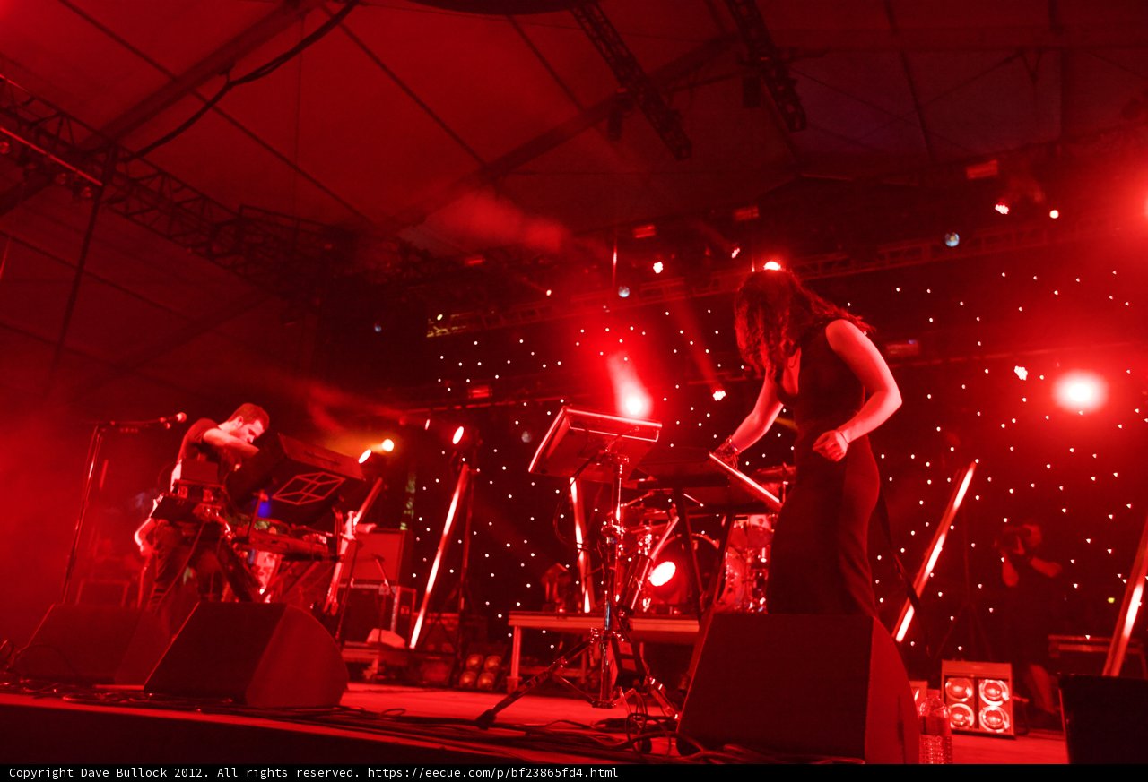 Red Spotlight on the Crowd at a Rock Concert