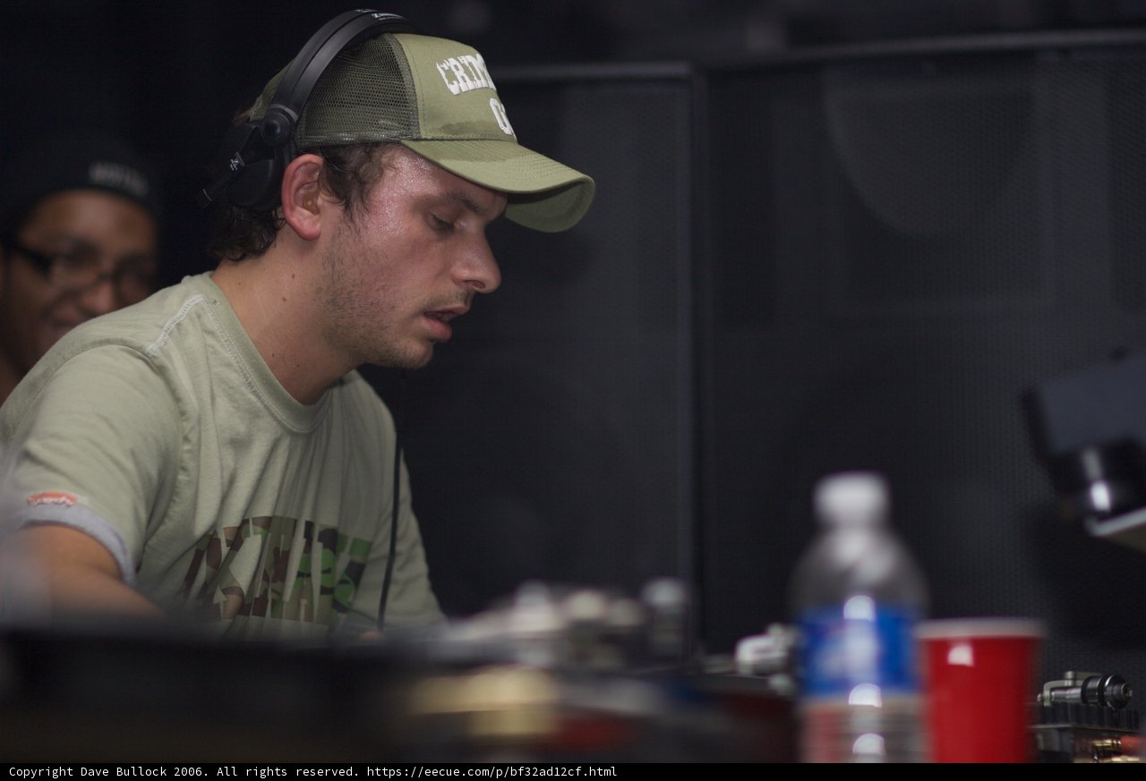 Andy C Spinning Tracks in a Green Tee