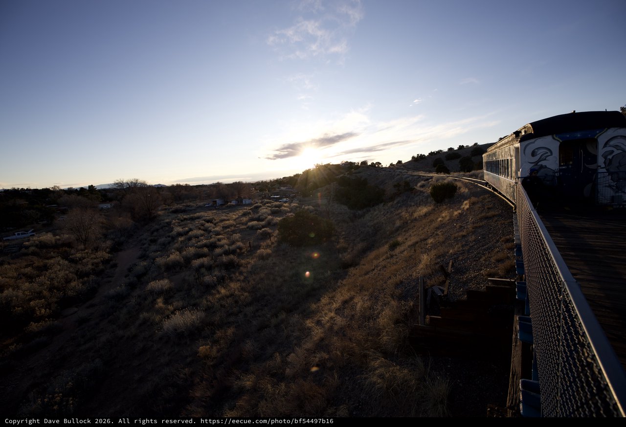 Sunset Train Journey Through Arizona Desert Landscape