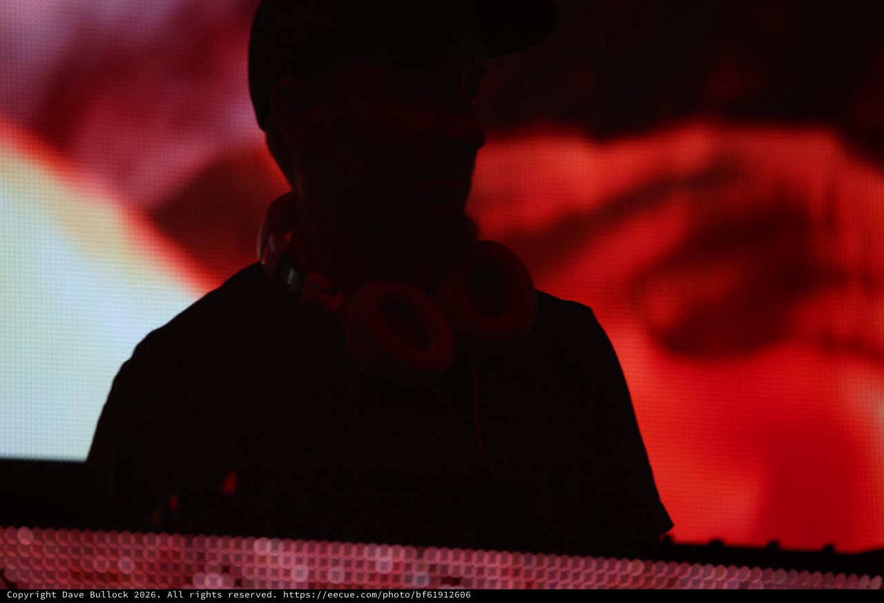 DJ Silhouette Bathed in Red Stage Light