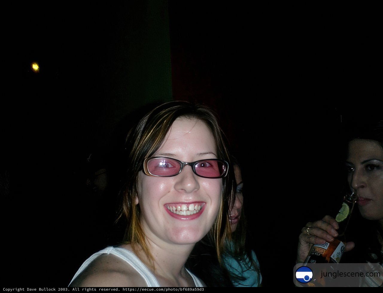 Smiling in the Dark with Glasses