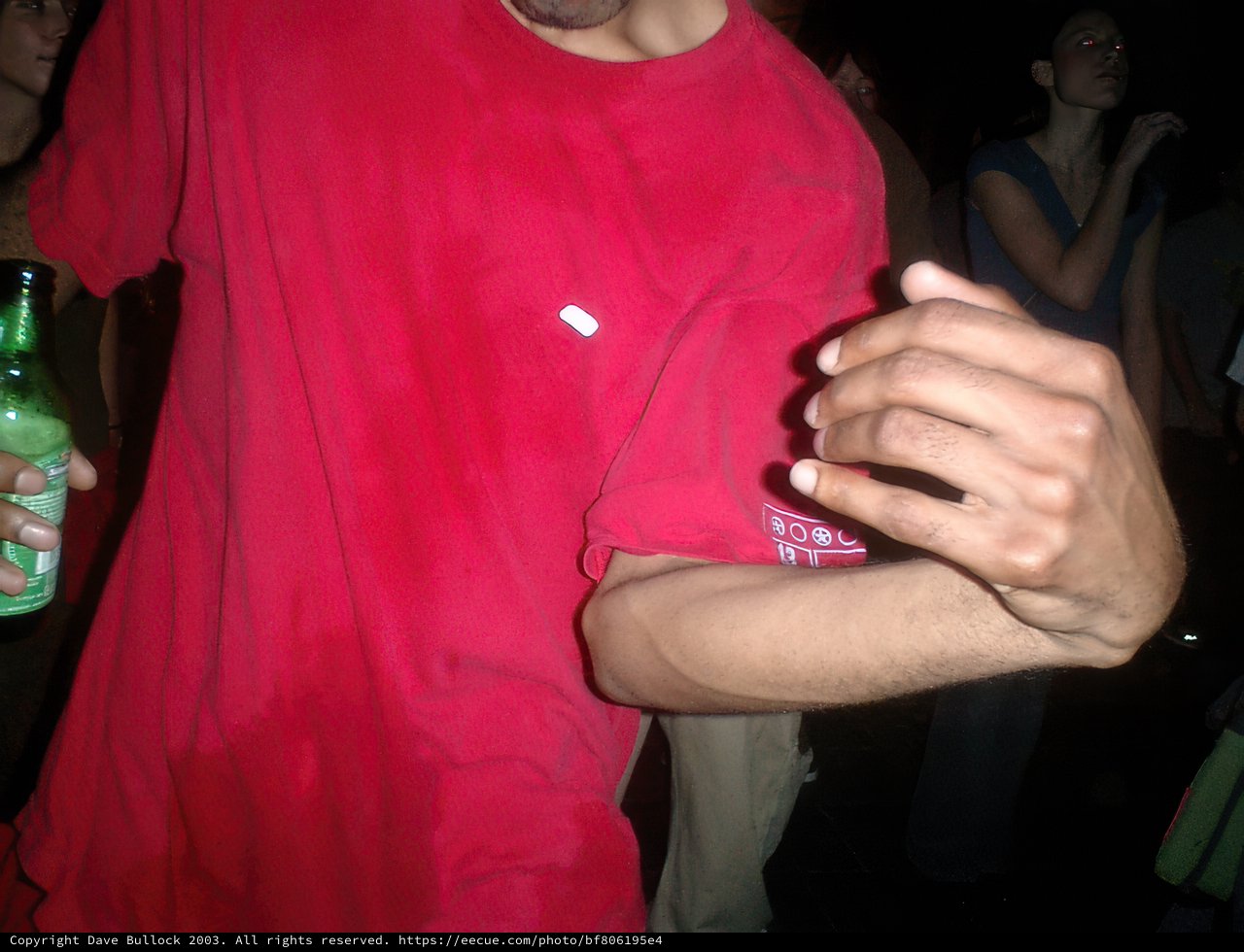Red Shirt Man Enjoying a Cold Beer
