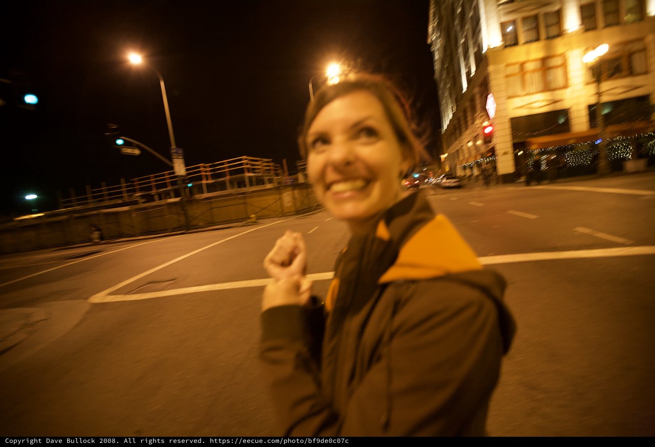 Joyful Celebration on Empty City Streets at Night
