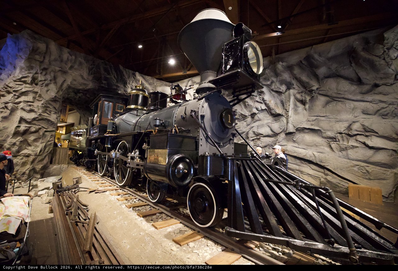 Vintage Steam Locomotive Display in Museum Cave Setting