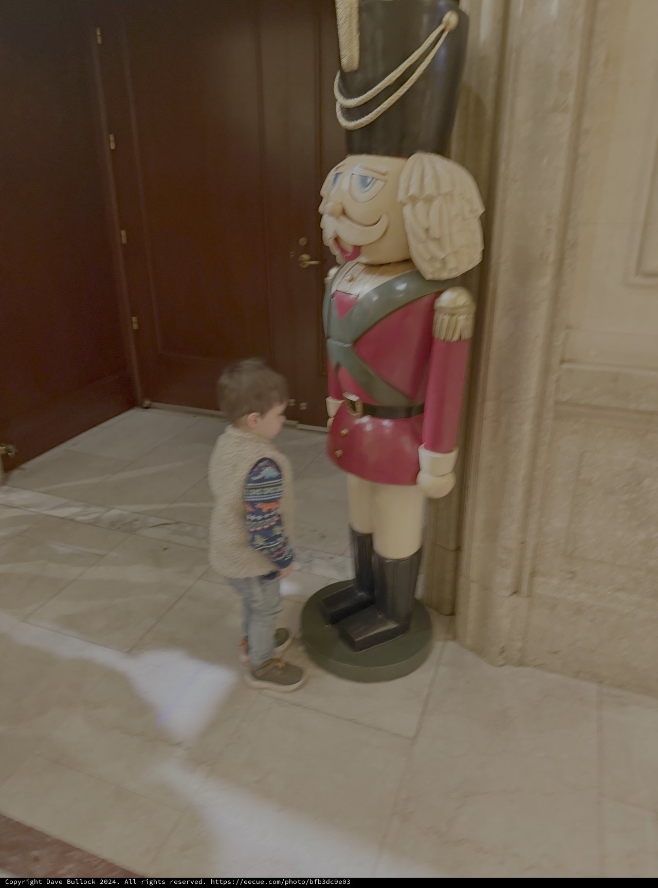 Child Meets Large Nutcracker Holiday Display
