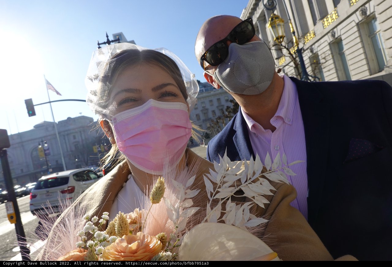 Masked Wedding Couple in Urban Setting