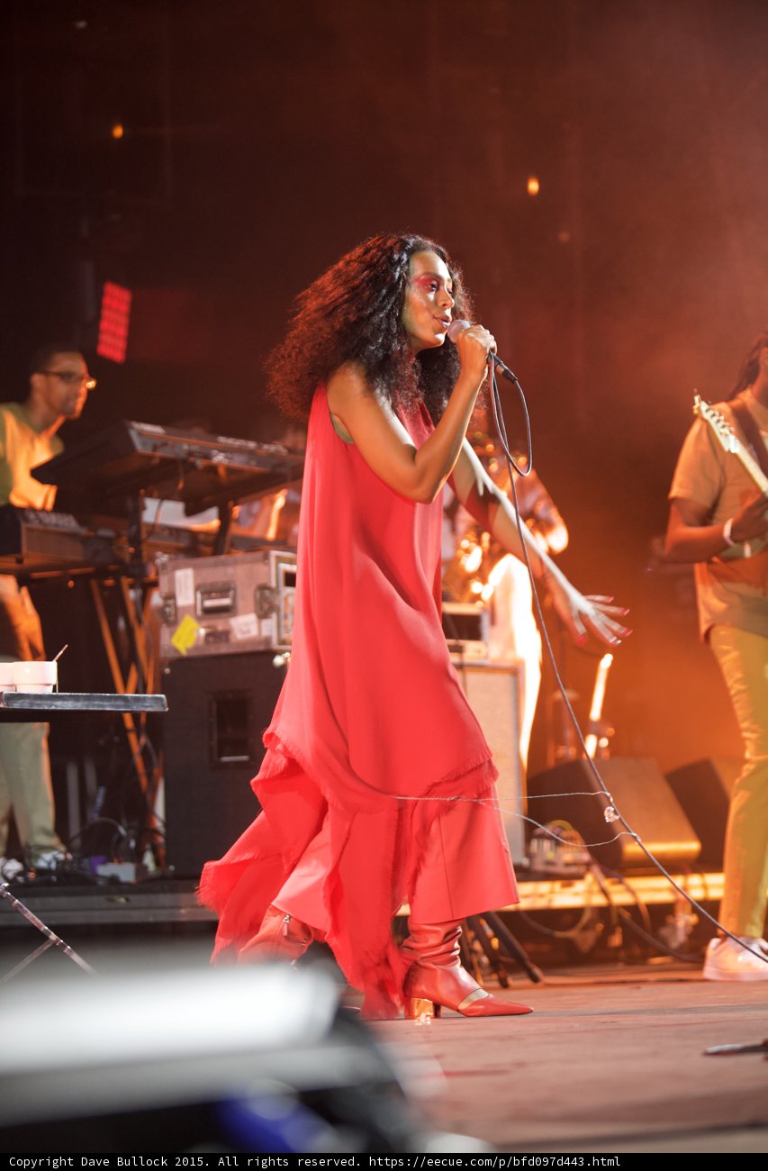 Solange Full Body Profile Flowing Red Dress Band Orange Haze