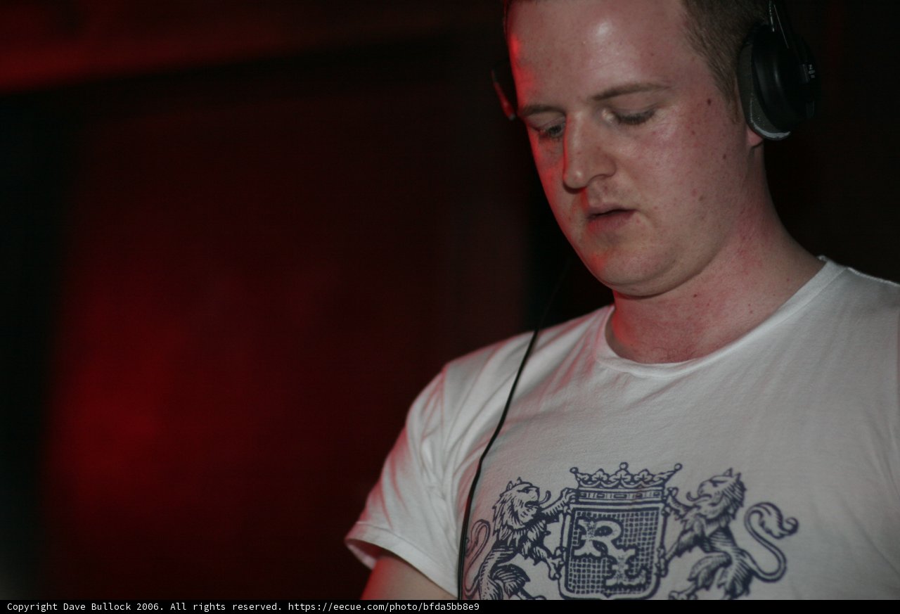 Headphones and White Tee