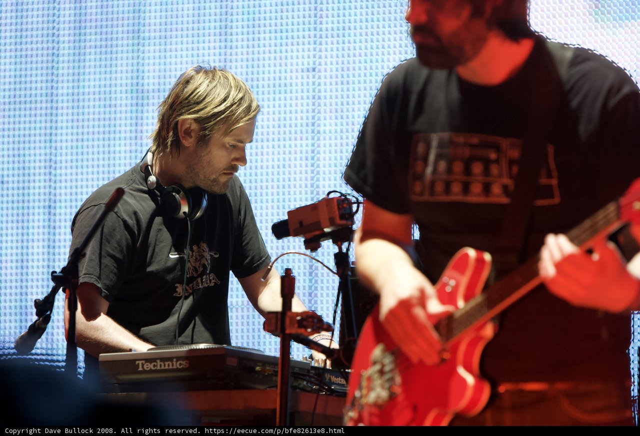 Two Men Entertaining the Crowd with Music
