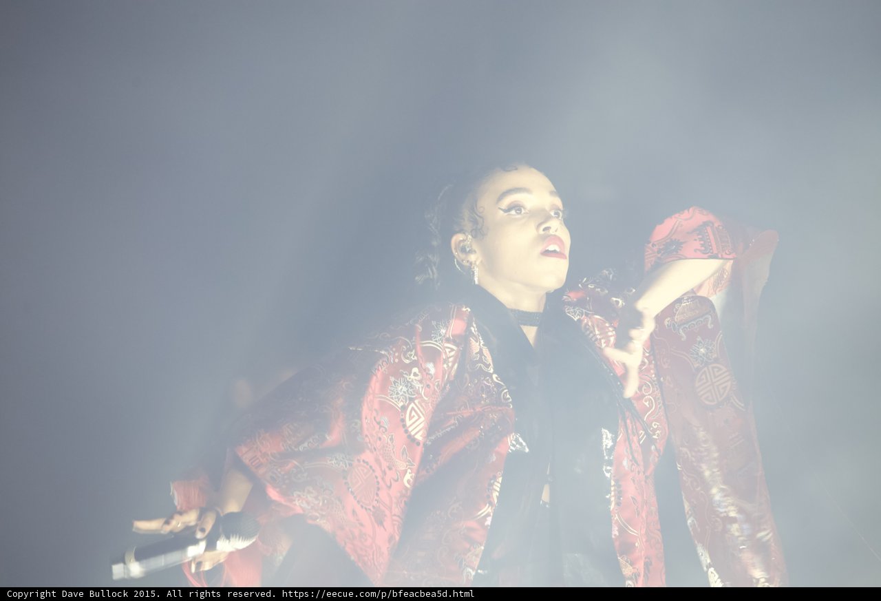 FKA twigs Profile Looking Upward Microphone Red Brocade Kimono Flowing Black Choker Hoop Earrings Atmospheric