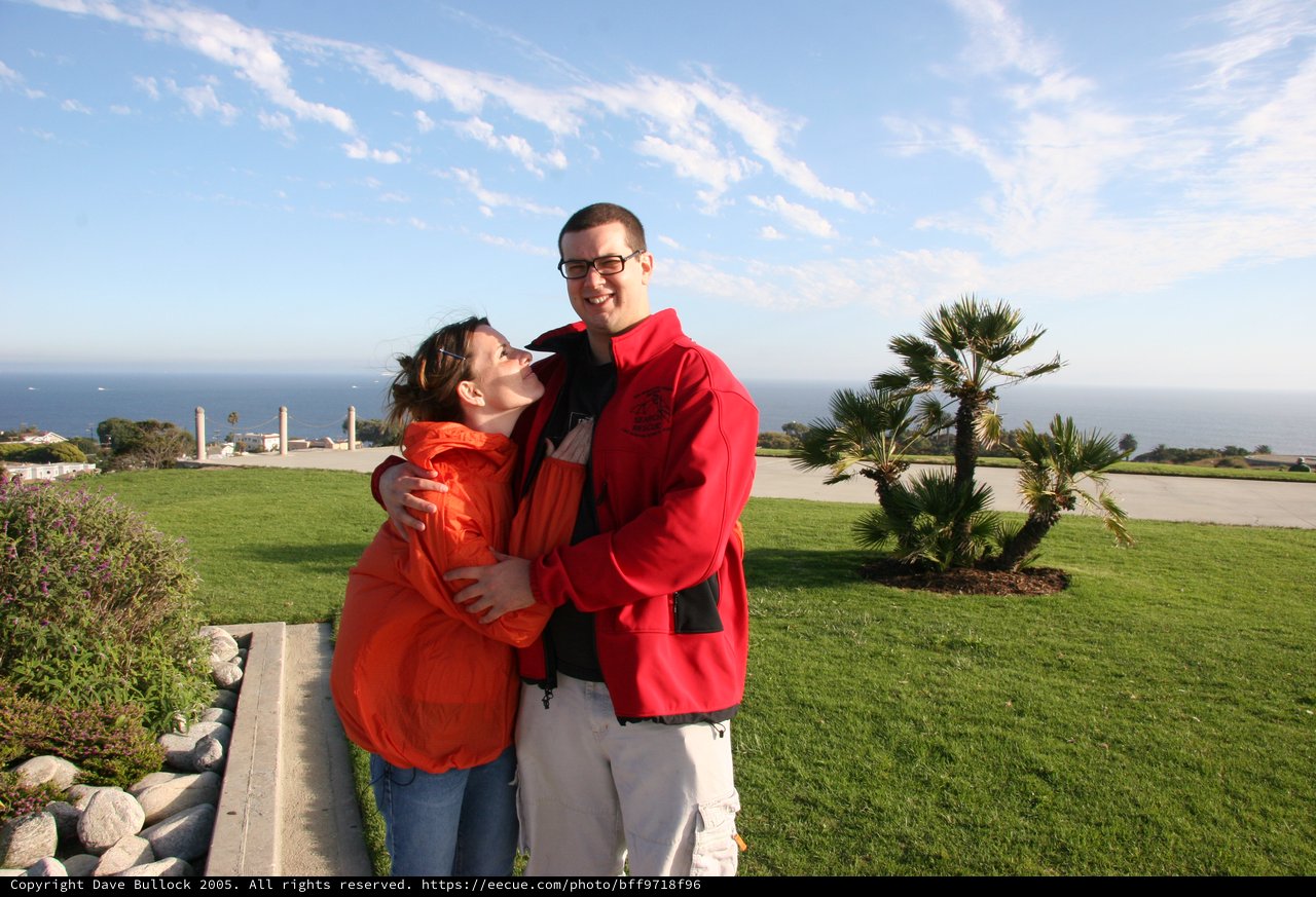 Couple Embracing at Coastal California Overlook