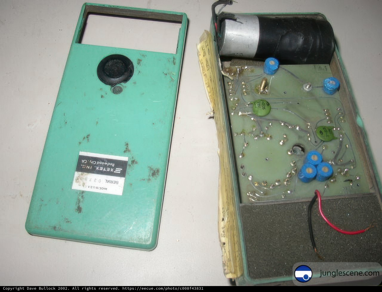 Green Electronic Device with Wires and a Battery