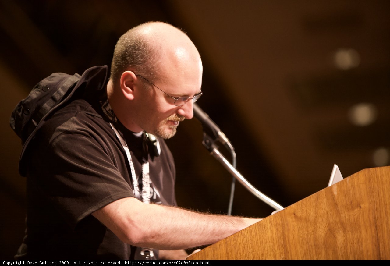 Bald Man Speaking at DefCon 17