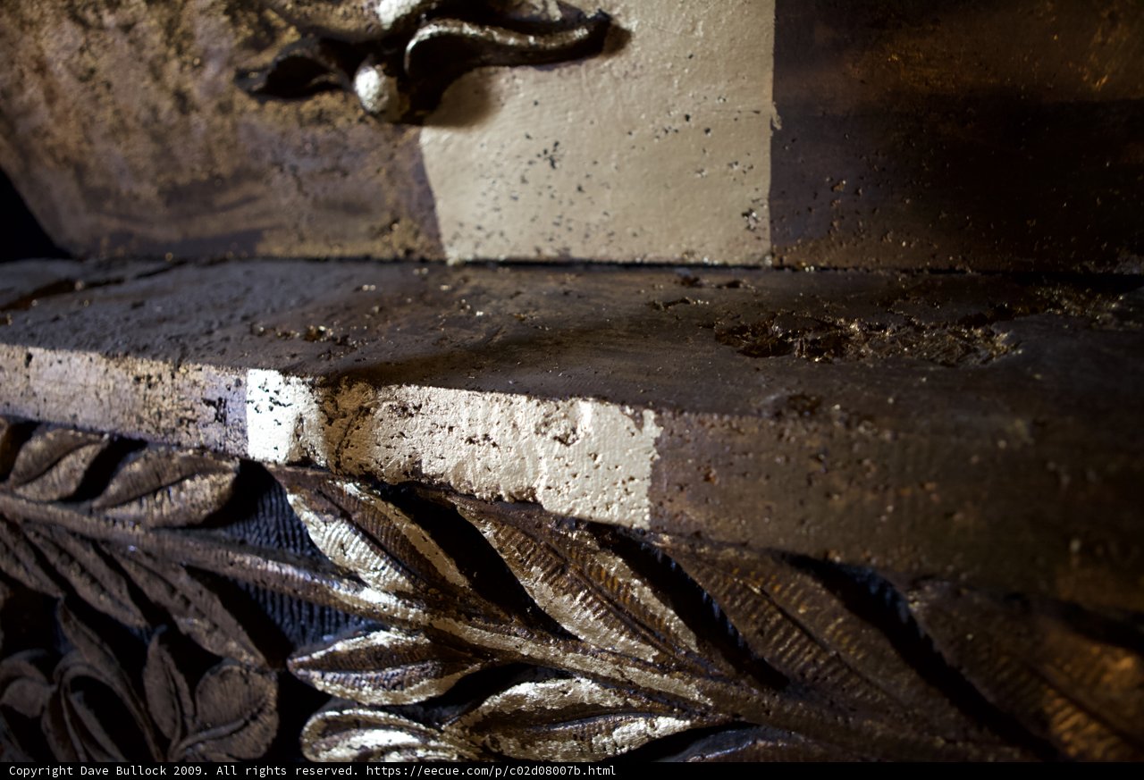 Glittering Bronze Emblem in a Crypt