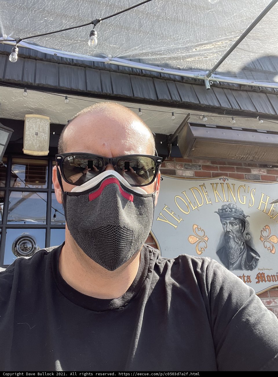 Masked Man in Front of Bar