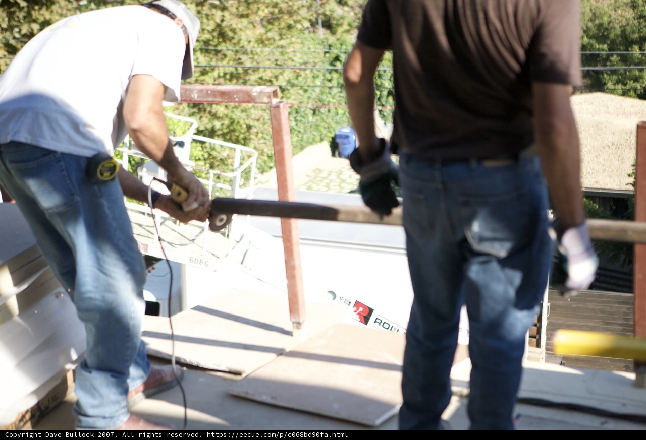 Working on a Wooden Beam