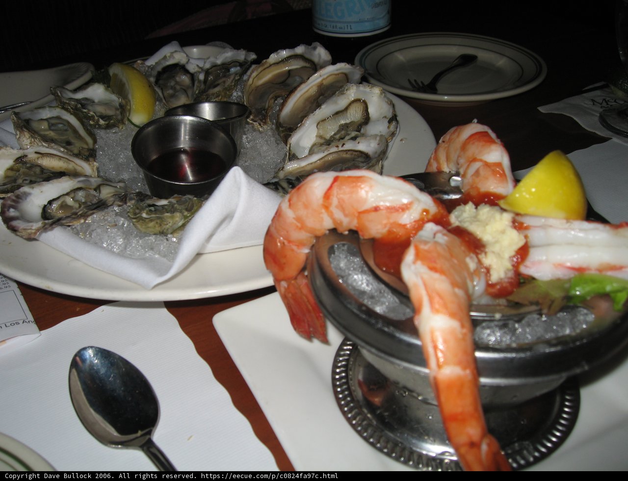 Plate of mouthwatering seafood and citrus fruits