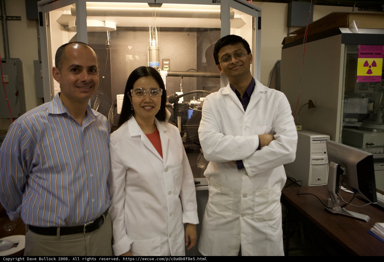 Three Scientists in Lab Coats