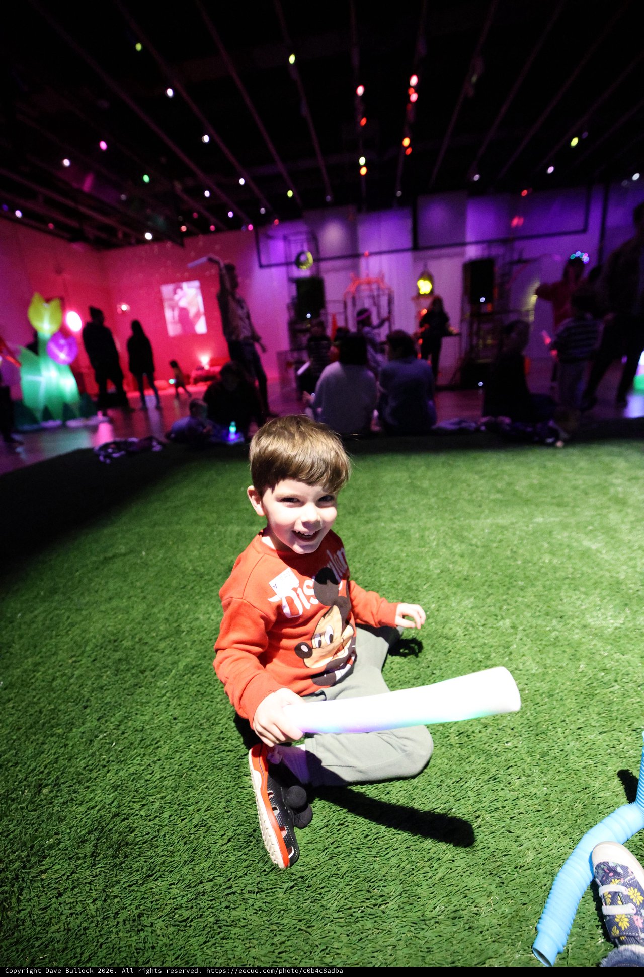 Joyful Child at Baby Rave Interactive Art Experience
