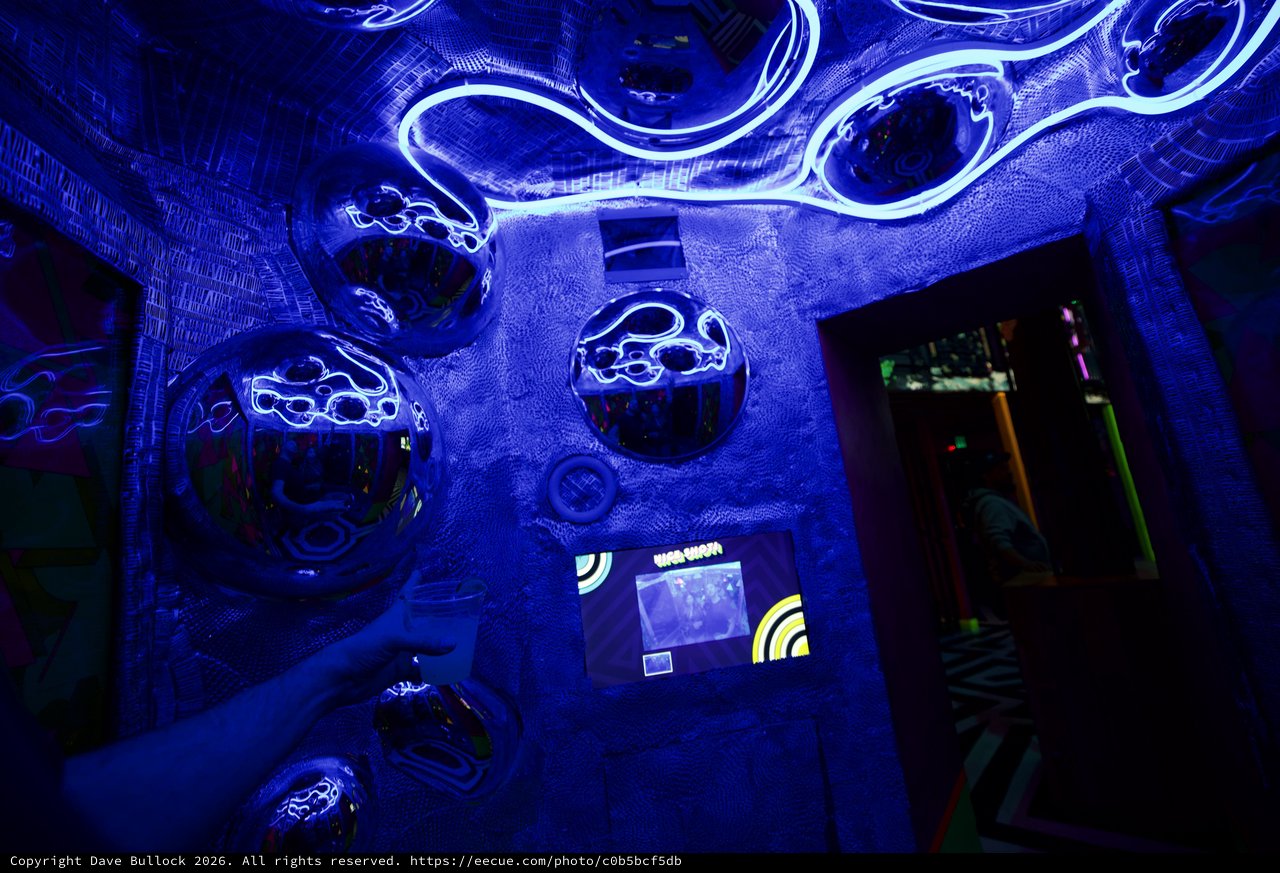 Immersive UV Light Installation with Glowing Tentacles