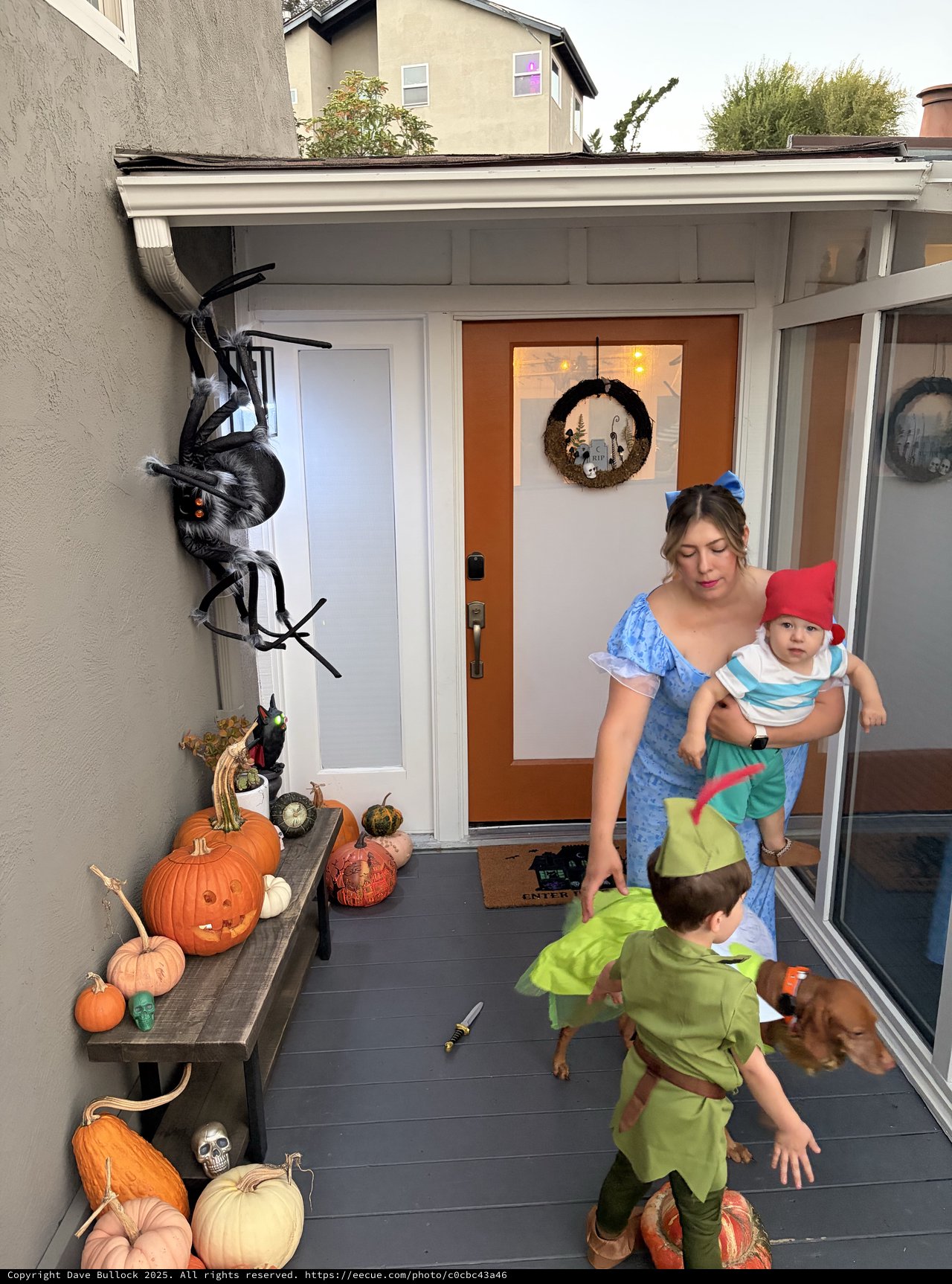 Halloween Porch Scene with Family in Costume