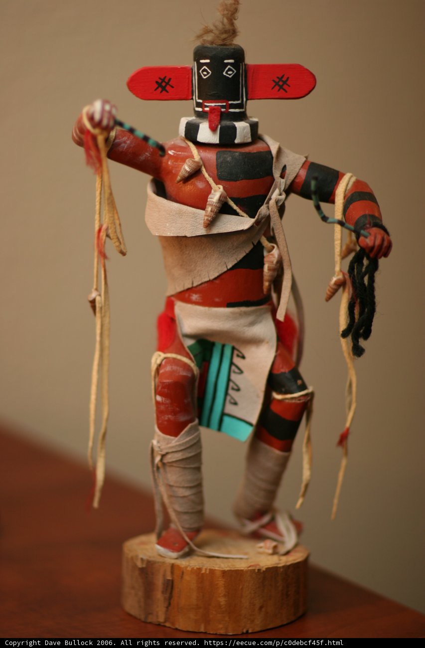 Native American Figurine with Striking Headdress