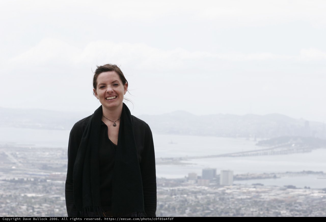 Smiling Woman Overlooking San Francisco Bay