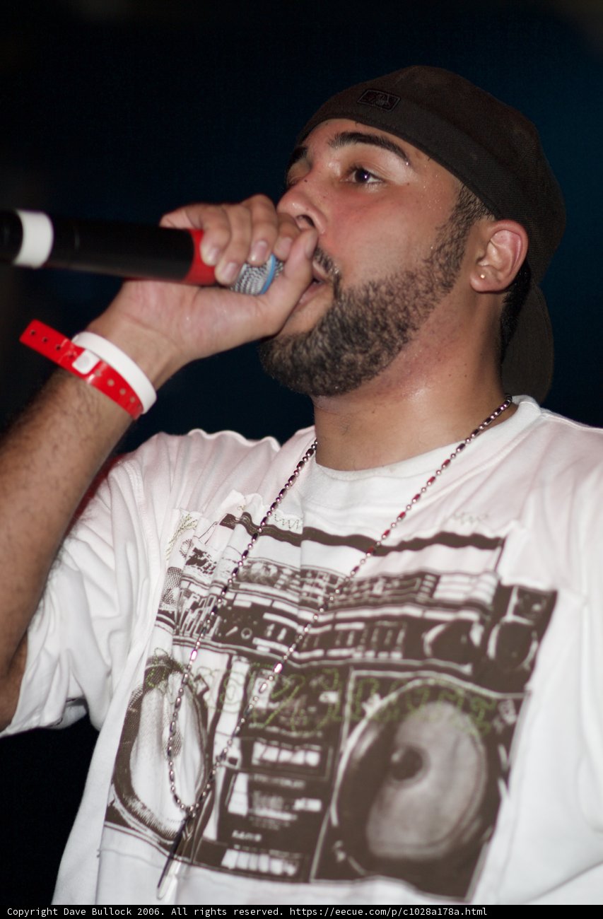 Solo Performance in a White Tee